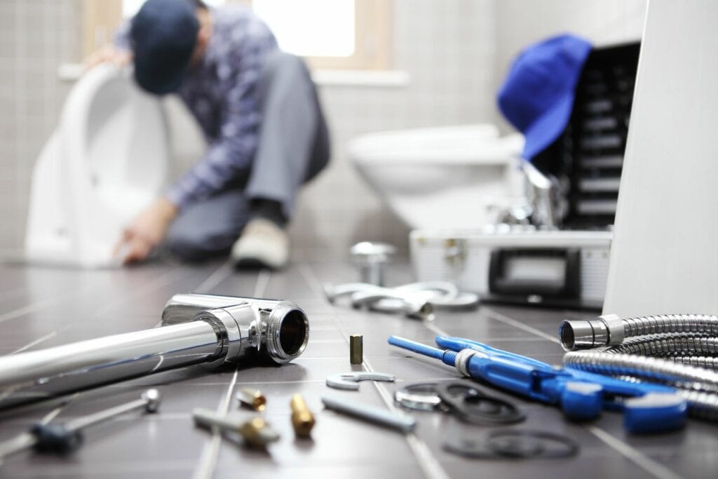 A plumber uses tools. Do I Need a Plumbing Inspection?