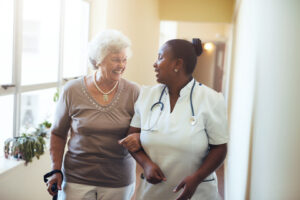 Nurse and patient in nursing home