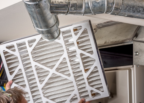 Changing the filter in the furnace of a Marmora, NJ home