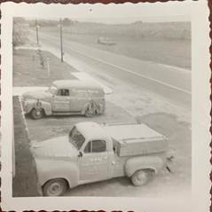 old style trucks parked in front of Broadley's headquarters