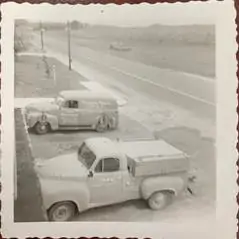 old style trucks parked in front of Broadley's headquarters